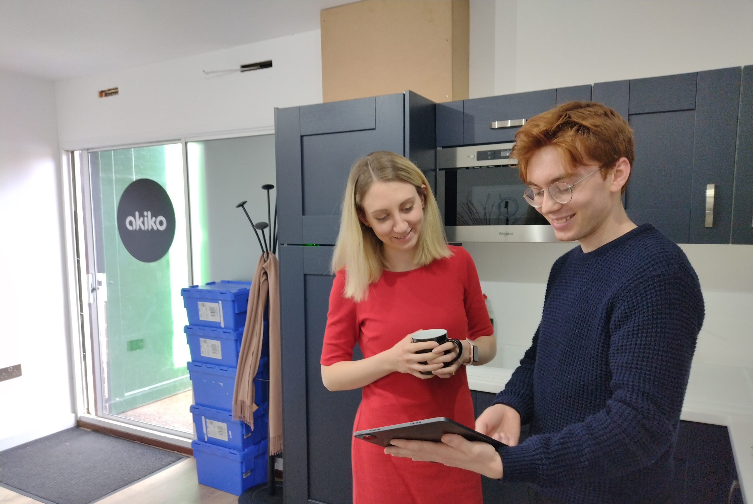 Deputy Police and Crime Commissioner for Surrey Ellie Vesey-Thompson with graphic design student Jack Dunlop inside the Akiko Design studios in Bramley