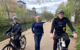 Police and Crime Commissioner for Surrey Lisa Townsend and local police officers with electric bikes on the Woking canal