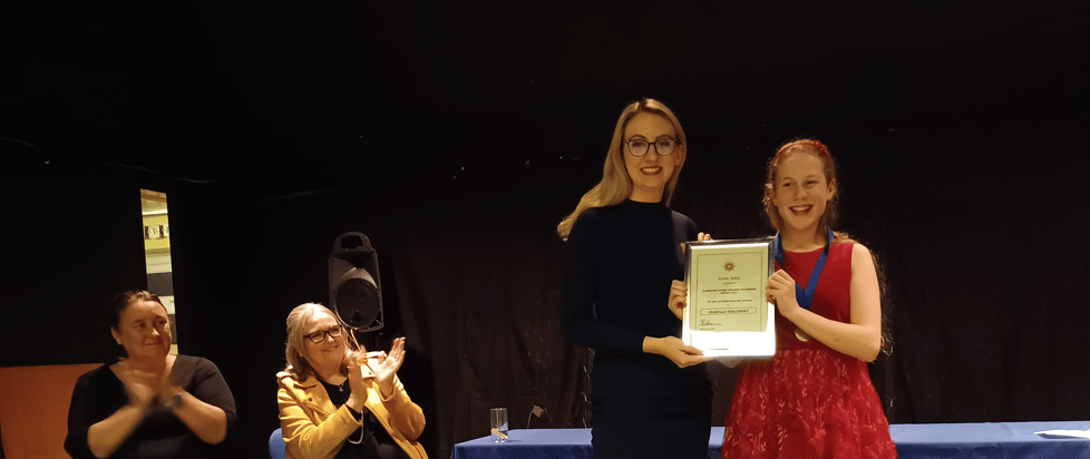 Deputy Police and Crime Commissioner Ellie Vesey-Thompson awarding a young person with a certificate
