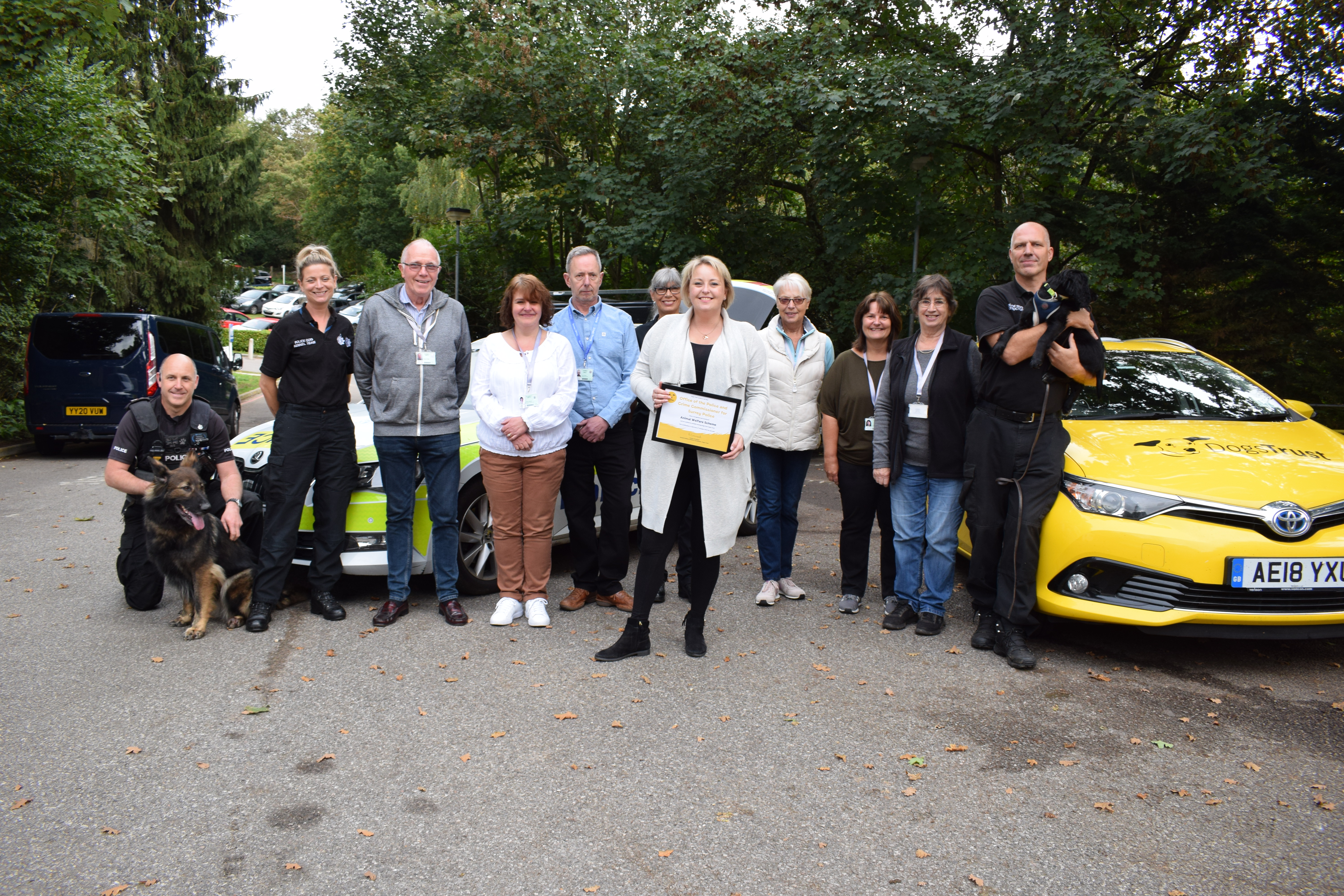 Police and Crime Commissioner Lisa Townsend with Surrey Police and Sussex Police dog school officers, Animal Welfare Scheme visitors and representatives from the Dogs Trust and RSPCA.