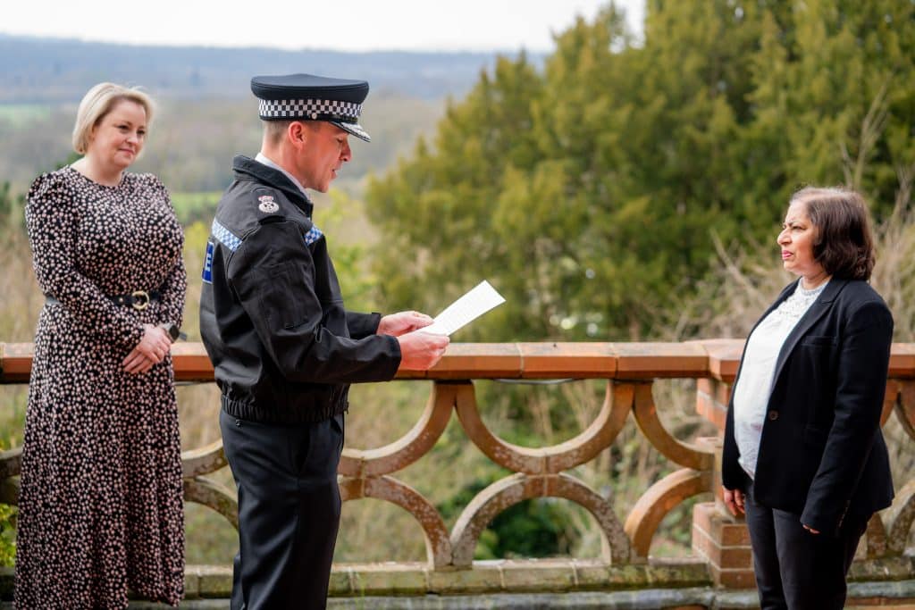 Attestation of new Chief Constable of Surrey Police Tim De Meyer standing alongside Police and Crime Commissioner for Surrey Lisa Townsend