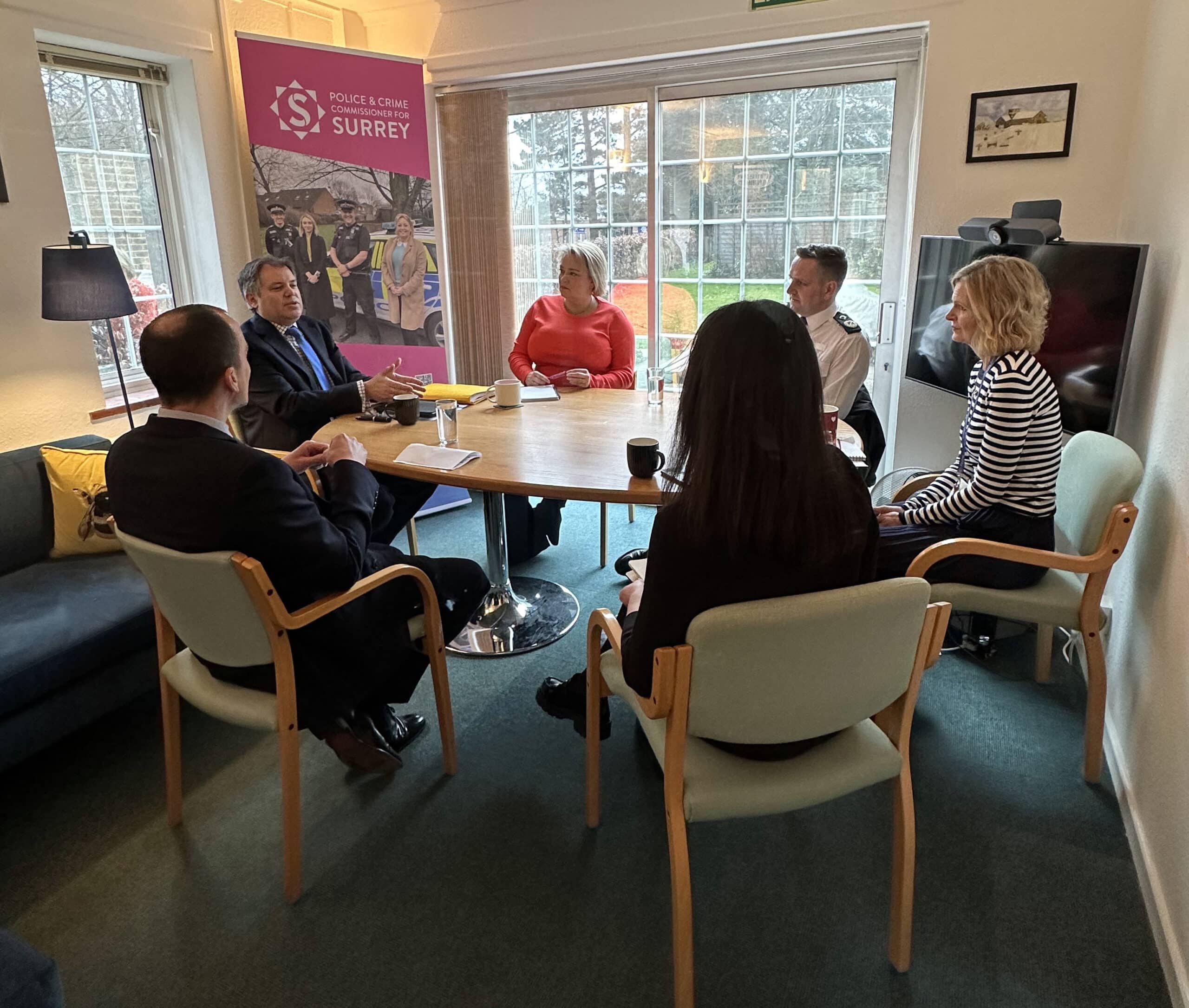 Office of the Commissioner and Surrey Police staff in a meeting at the PCCs office